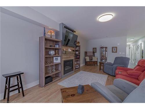 114-130 Water Street Street, Gananoque, ON - Indoor Photo Showing Living Room With Fireplace