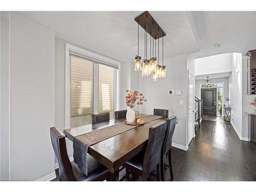 952 Edward Riley Drive, Kingston, ON - Indoor Photo Showing Dining Room With Fireplace