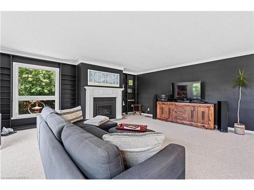 3 Thunderbird Circle, Kingston, ON - Indoor Photo Showing Living Room With Fireplace