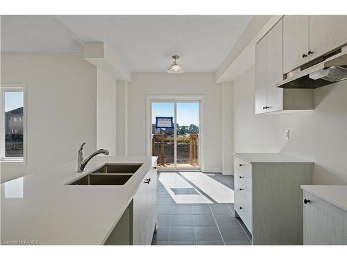 115 Gildersleeve Boulevard, Bath, ON - Indoor Photo Showing Kitchen With Double Sink