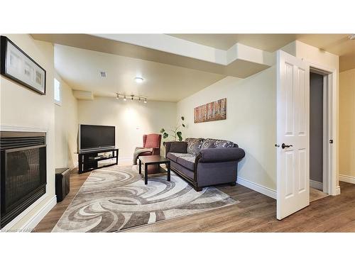 156 Mcdonough Crescent, Amherstview, ON - Indoor Photo Showing Living Room With Fireplace