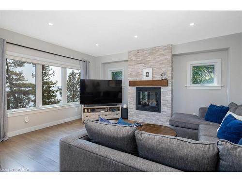 4506 Bath Road, Amherstview, ON - Indoor Photo Showing Living Room With Fireplace