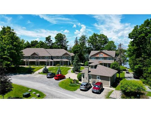 2-10-532 10Th Concession Road, Westport, ON - Outdoor With Deck Patio Veranda With Facade