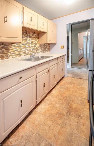 410-334 Queen Mary Road, Kingston, ON - Indoor Photo Showing Kitchen With Double Sink