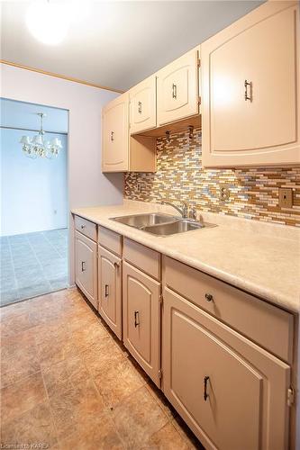 410-334 Queen Mary Road, Kingston, ON - Indoor Photo Showing Kitchen With Double Sink