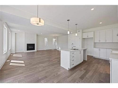 1395 Monarch Drive, Kingston, ON - Indoor Photo Showing Kitchen With Fireplace