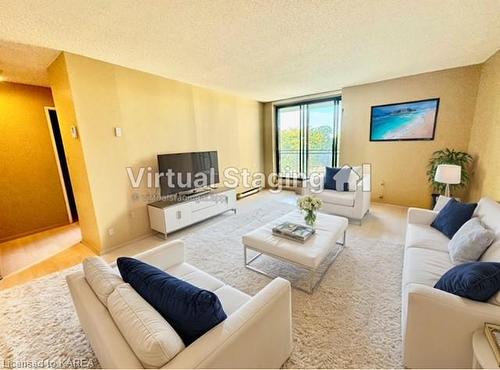 411-120 Barrett Court, Kingston, ON - Indoor Photo Showing Living Room