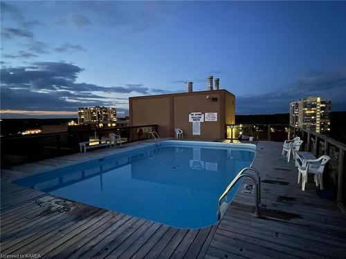 411-120 Barrett Court, Kingston, ON - Outdoor With In Ground Pool