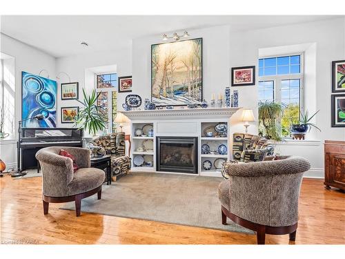 11 Cross Street, Odessa, ON - Indoor Photo Showing Living Room With Fireplace