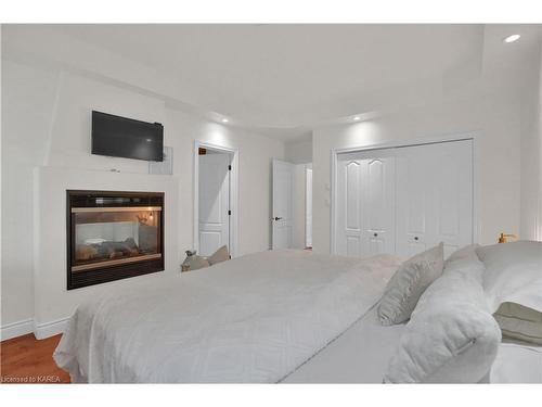 1090 Fawn Court, Kingston, ON - Indoor Photo Showing Bedroom With Fireplace