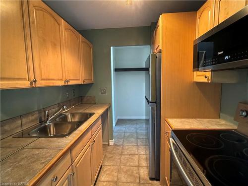 305-334 Queen Mary Road, Kingston, ON - Indoor Photo Showing Kitchen With Double Sink