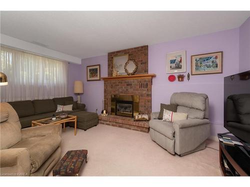 963 Auden Park Drive, Kingston, ON - Indoor Photo Showing Living Room With Fireplace