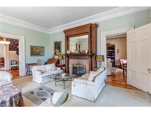 5 Emily Street, Kingston, ON - Indoor Photo Showing Living Room With Fireplace