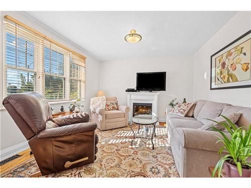 4 Montgomery Boulevard, Kingston, ON - Indoor Photo Showing Living Room With Fireplace