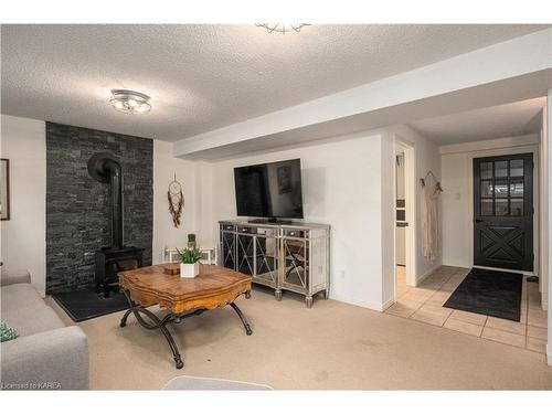 87 Sunset Boulevard, Kingston, ON - Indoor Photo Showing Living Room With Fireplace