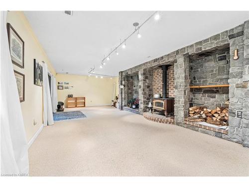 1733 Hitchcock Drive, Inverary, ON - Indoor Photo Showing Other Room With Fireplace