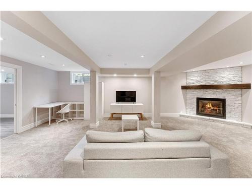 81 Kenwoods Circle, Kingston, ON - Indoor Photo Showing Living Room With Fireplace