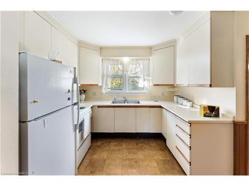 203 Arnold Street, Kingston, ON - Indoor Photo Showing Kitchen With Double Sink