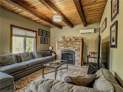 1977 Thorpe Road, Odessa, ON - Indoor Photo Showing Living Room With Fireplace