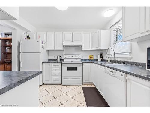 303 Conacher Drive, Kingston, ON - Indoor Photo Showing Kitchen With Double Sink