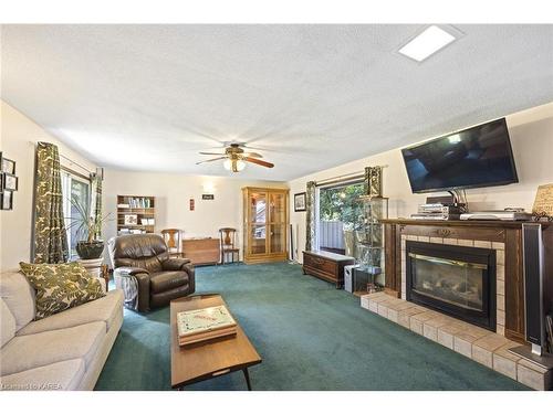 1610 John Counter Boulevard, Kingston, ON - Indoor Photo Showing Living Room With Fireplace