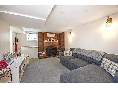 1610 John Counter Boulevard, Kingston, ON - Indoor Photo Showing Living Room With Fireplace