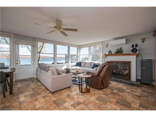 50 Osprey Lane, Westport, ON - Indoor Photo Showing Living Room With Fireplace