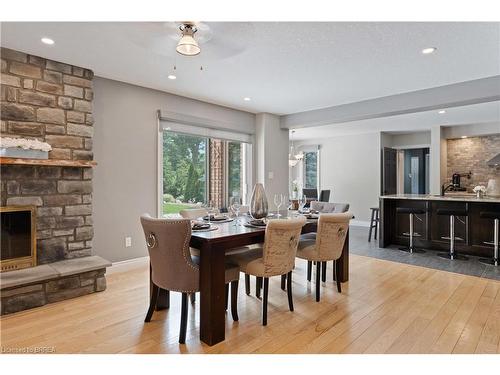 17 Scarfe Gardens, Brantford, ON - Indoor Photo Showing Dining Room With Fireplace