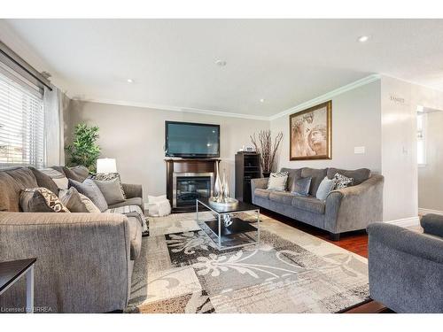 12 Shantz Avenue, Brantford, ON - Indoor Photo Showing Living Room With Fireplace
