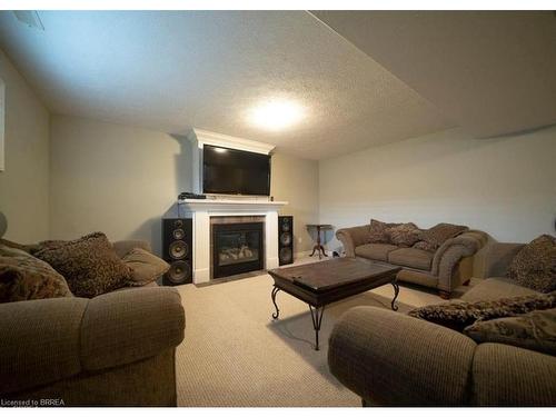 10-68 Fairview Drive, Brantford, ON - Indoor Photo Showing Living Room With Fireplace