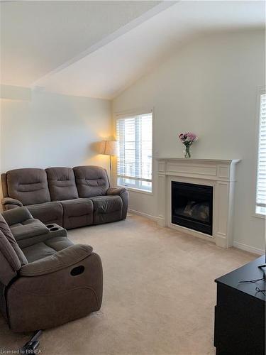 90 Barrett Avenue, Brantford, ON - Indoor Photo Showing Living Room With Fireplace