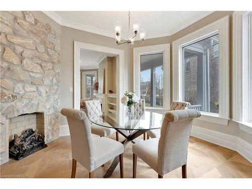 38 Dufferin Avenue, Brantford, ON - Indoor Photo Showing Dining Room With Fireplace