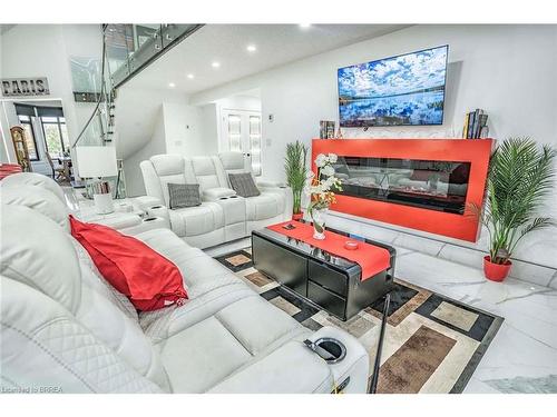 19 Zavarella Court, Paris, ON - Indoor Photo Showing Living Room With Fireplace