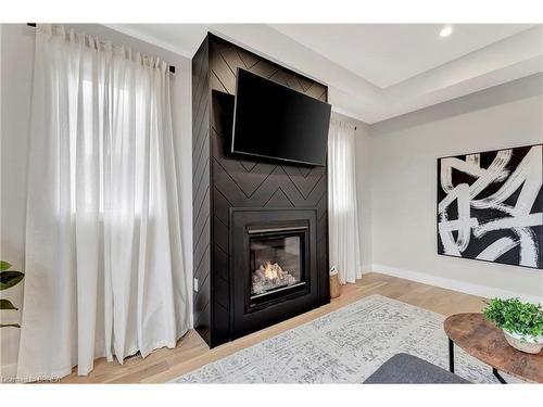 16 Macneil Court, Port Burwell, ON - Indoor Photo Showing Living Room With Fireplace