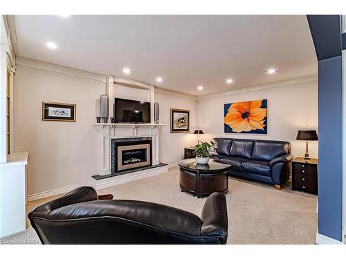 16 Camrose Drive, Brantford, ON - Indoor Photo Showing Living Room With Fireplace