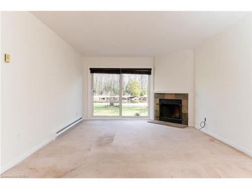 5-41 Laguna Parkway, Ramara, ON - Indoor Photo Showing Living Room With Fireplace