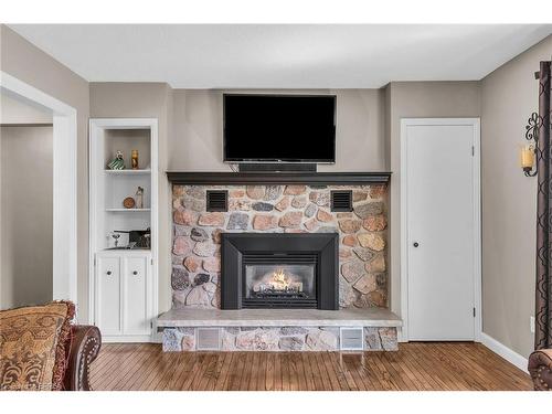 87 12Th Concession Road, Harley, ON - Indoor Photo Showing Living Room With Fireplace
