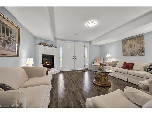 17-60 Dufferin Avenue, Brantford, ON - Indoor Photo Showing Living Room With Fireplace