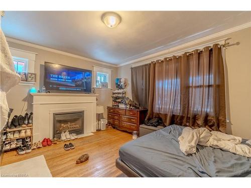 204 Marlborough Street, Brantford, ON - Indoor Photo Showing Bedroom With Fireplace