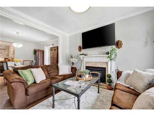 109 St Paul Avenue, Brantford, ON - Indoor Photo Showing Living Room With Fireplace