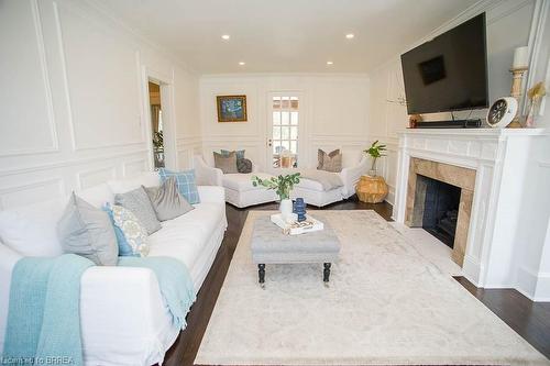 414 Broadway Street, Tillsonburg, ON - Indoor Photo Showing Living Room With Fireplace