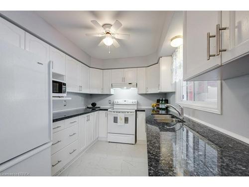 18-20 Courtland Drive, Brantford, ON - Indoor Photo Showing Kitchen With Double Sink