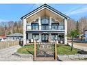 33 Cedar Drive, Turkey Point, ON  - Outdoor With Balcony With Facade 