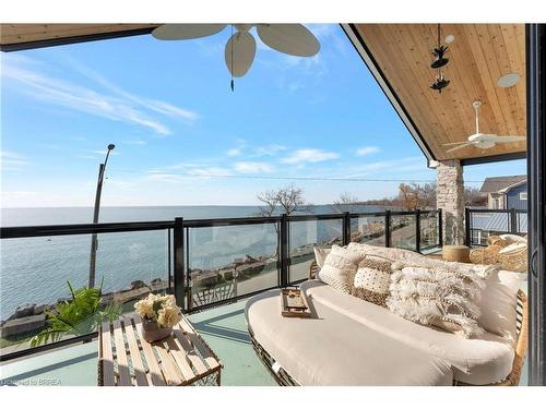 33 Cedar Drive, Turkey Point, ON - Outdoor With Body Of Water With Balcony With View