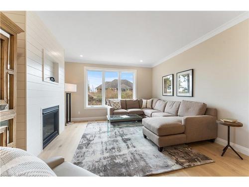 111 Judd Drive, Simcoe, ON - Indoor Photo Showing Living Room With Fireplace