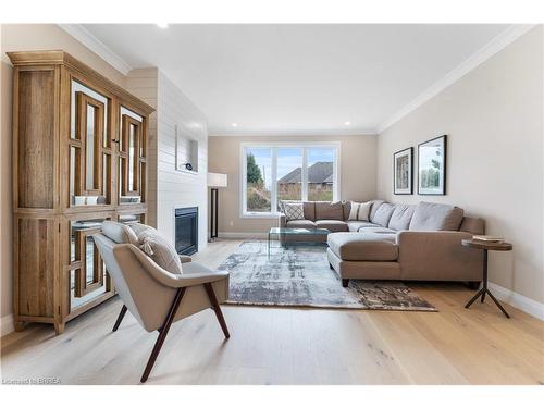 111 Judd Drive, Simcoe, ON - Indoor Photo Showing Living Room With Fireplace