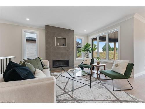 107 Judd Drive, Simcoe, ON - Indoor Photo Showing Living Room With Fireplace