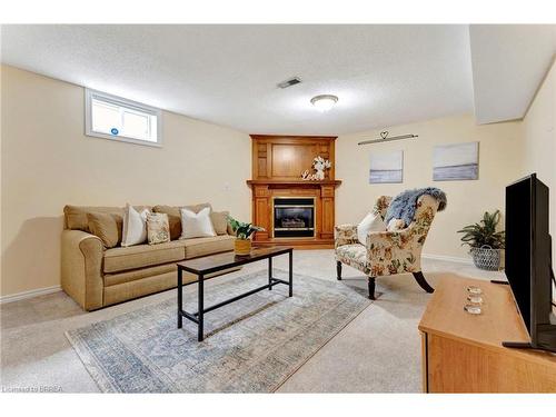 6-20 Courtland Drive, Brantford, ON - Indoor Photo Showing Living Room With Fireplace