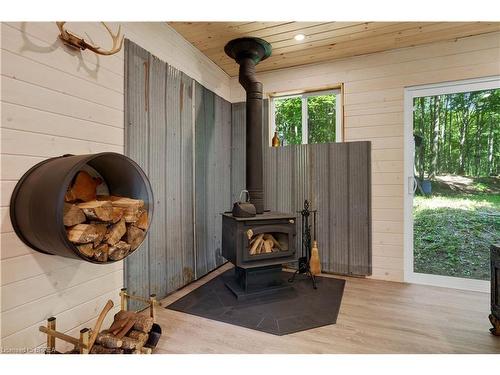 2122 Trapper'S Trail Road, Haliburton, ON - Indoor Photo Showing Other Room With Fireplace