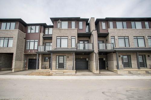 119-461 Blackburn Drive, Brantford, ON - Outdoor With Balcony With Facade